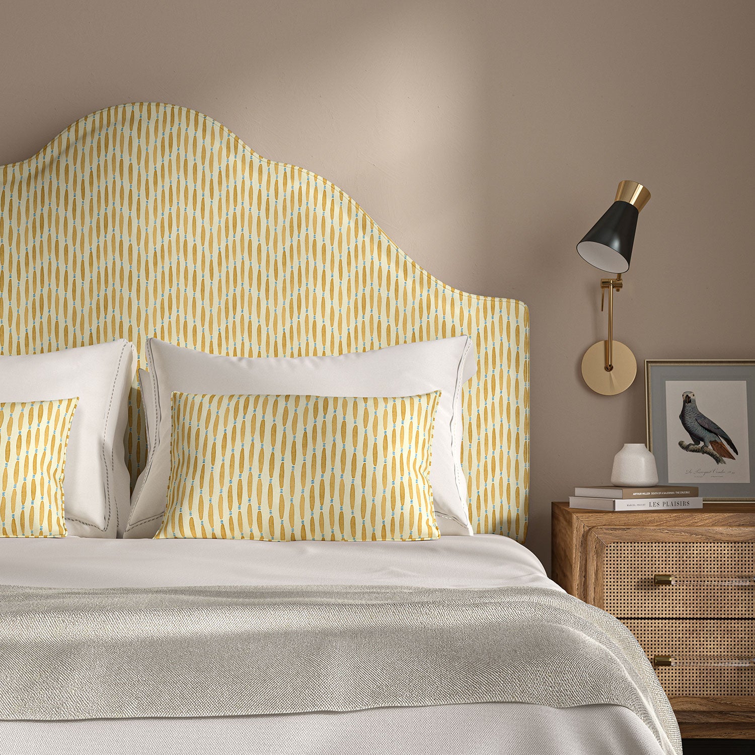Headboard upholstered in a printed linen fabric in yellow, blue and off white featuring a Japanese print.