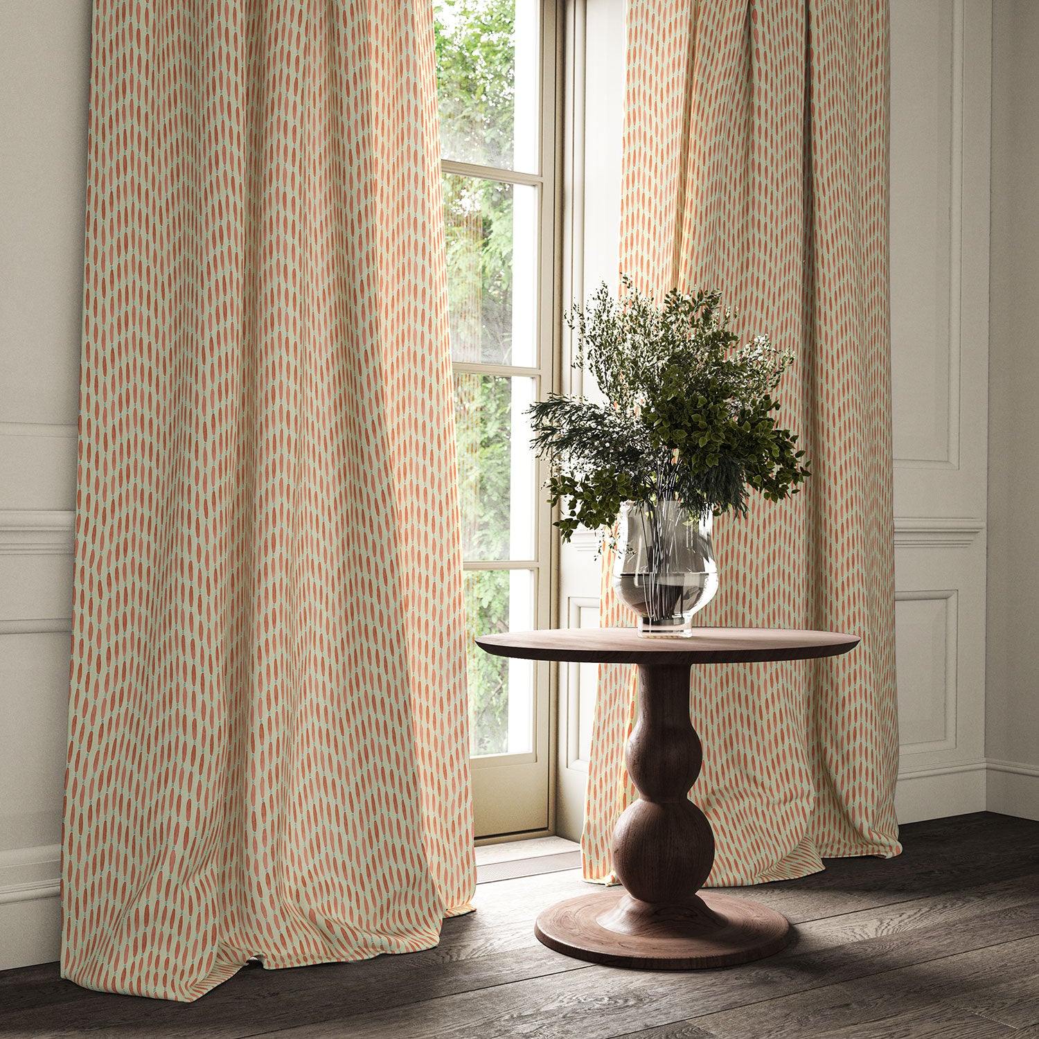 Curtains made from a printed linen fabric in orange, blue and off white featuring a Japanese print.