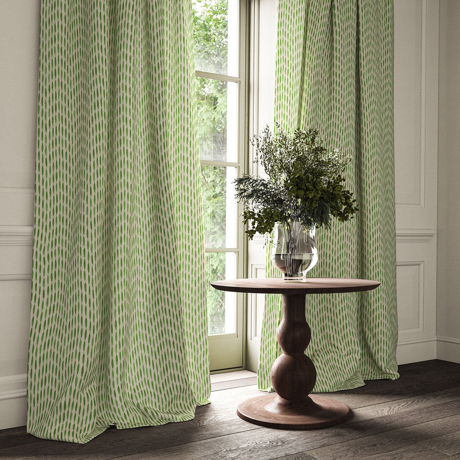 Curtains made from a printed linen fabric in green and off white featuring a Japanese print.