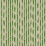 A printed linen fabric sample in green and off white featuring a Japanese print.