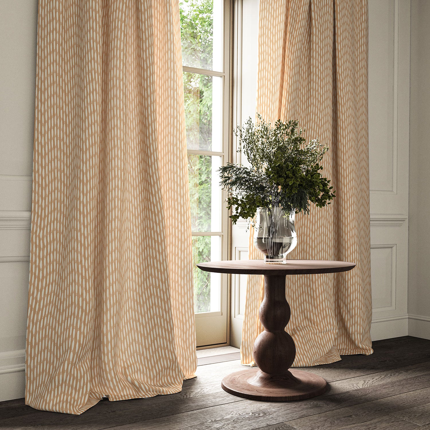 Curtains made from a printed linen fabric in orange and off white featuring a Japanese print.