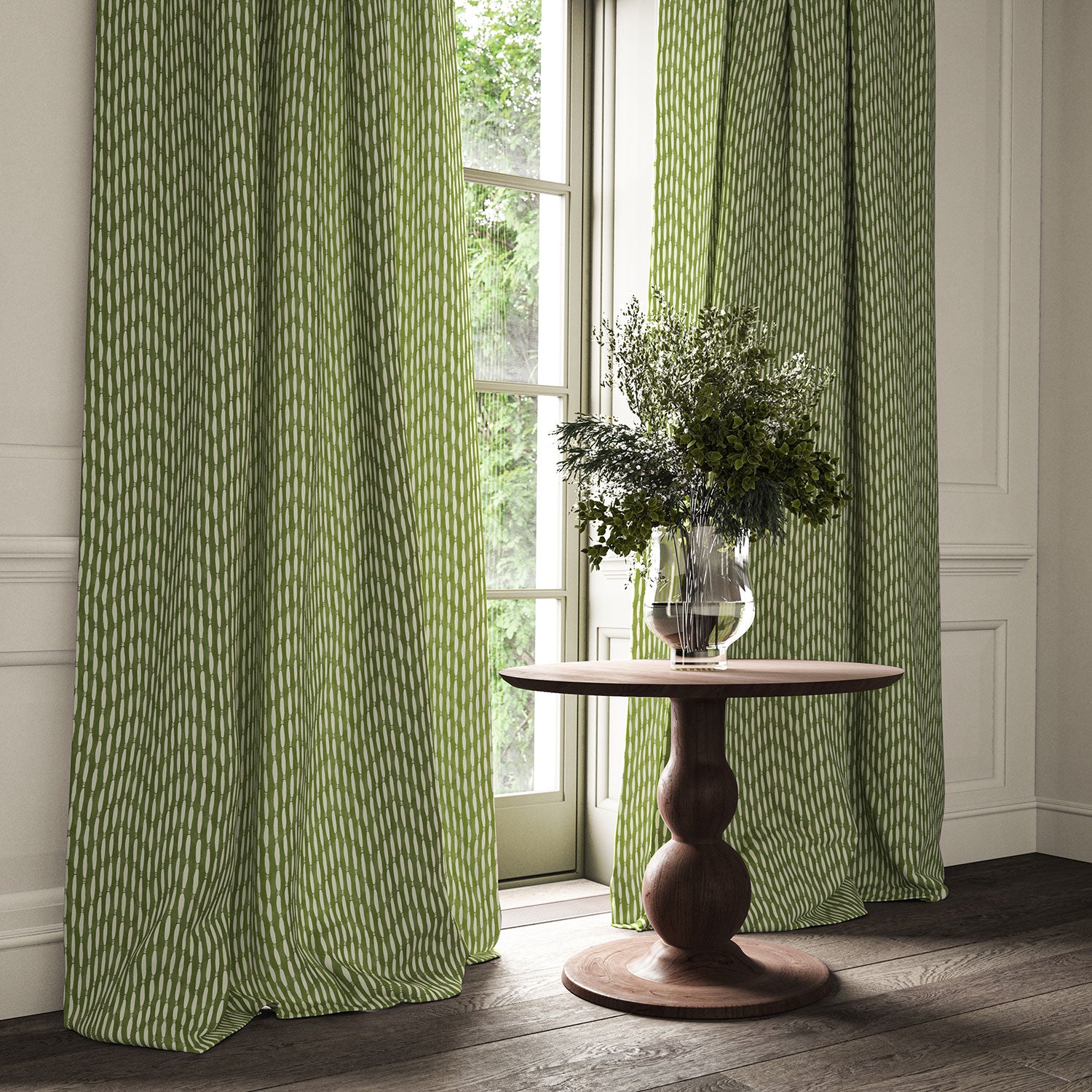Curtains made from a printed linen fabric in green and off white featuring a Japanese print.