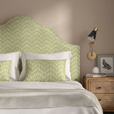 Headboard upholstered in a printed linen fabric in green and off white featuring a Japanese print.