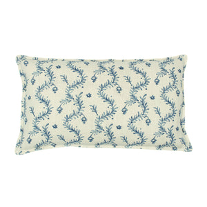 A blue and cream linen cushion with a marine-style pattern.