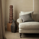 Chair upholstered in a plain luxurious woven fabric in cream.