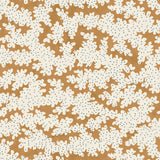 A printed linen fabric sample in orange, blue and off white featuring a stylized coral pattern.