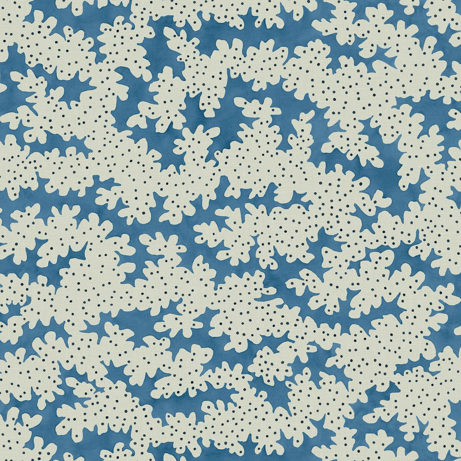 A printed linen fabric sample in blue, black and off white featuring a stylized coral pattern.