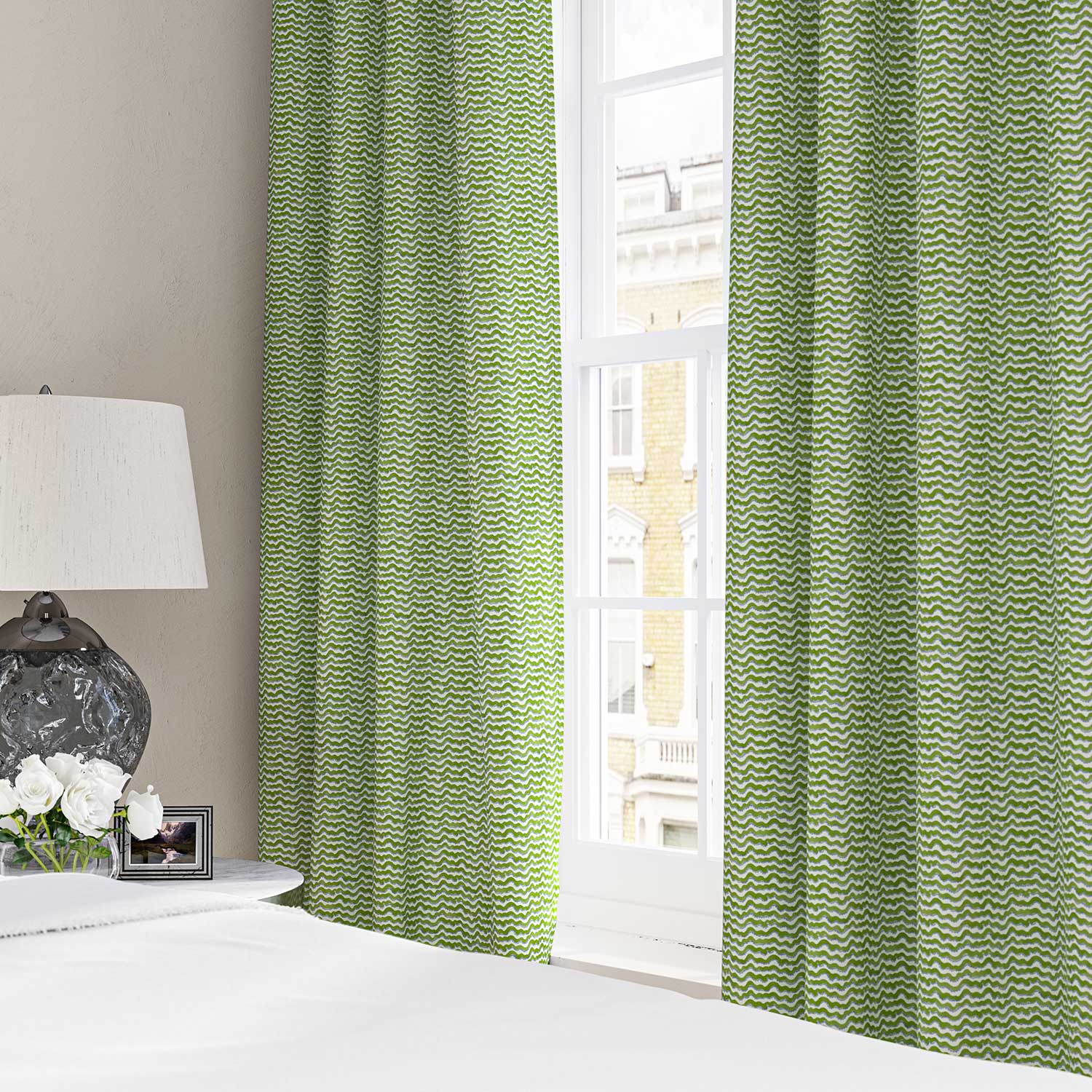 Curtains made from a printed linen fabric in blue, green and off white featuring a sound wave pattern