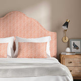 Headboard upholstered in printed linen fabric sample in a red, blue and off white featuring a sound wave pattern