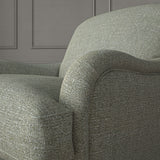 Woven grey coloured fabric on a chair