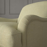 Woven cream coloured fabric on a chair