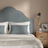 Woven blue coloured fabric on a headboard