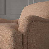 Woven Salmon coloured fabric on a chair