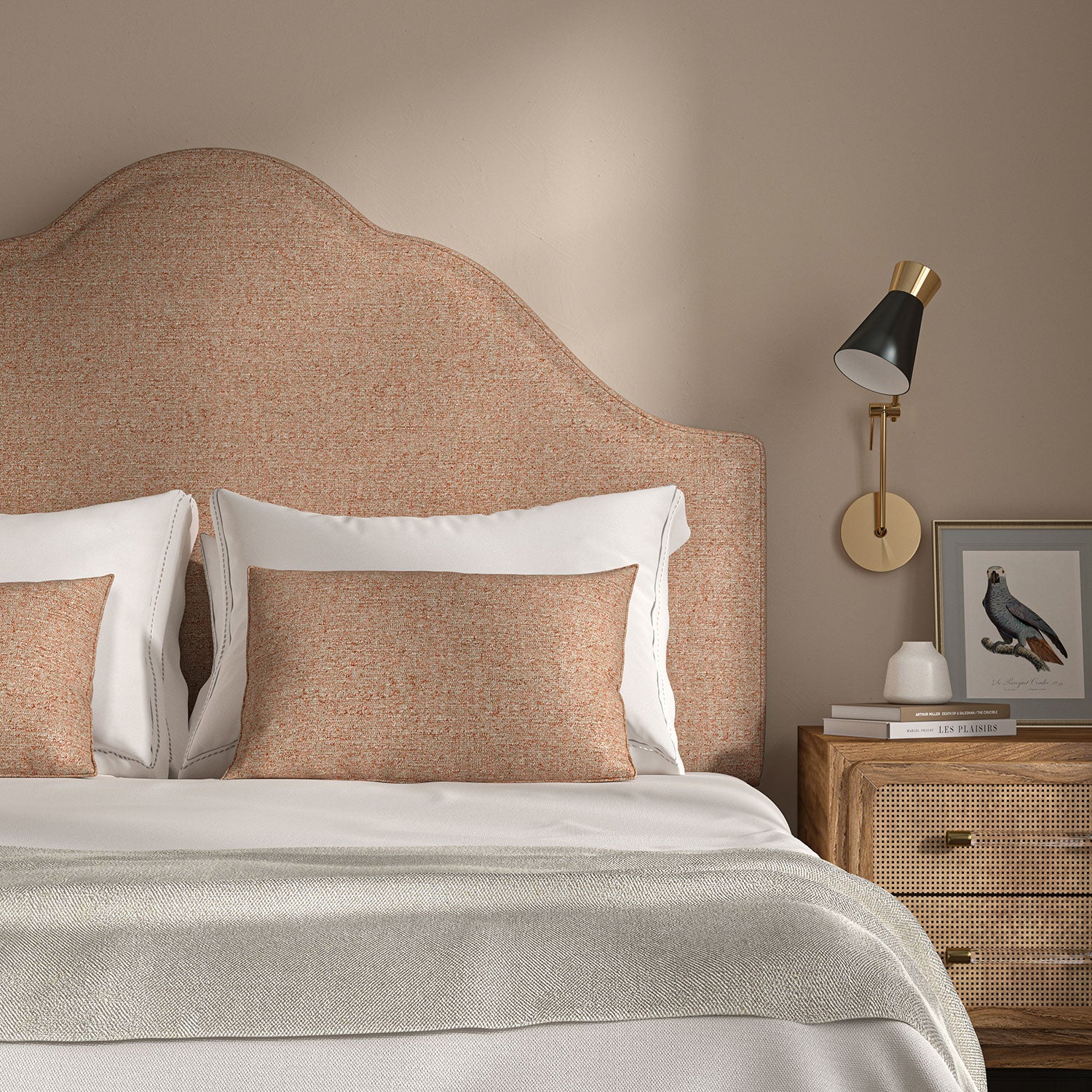 Woven Salmon coloured fabric on a headboard