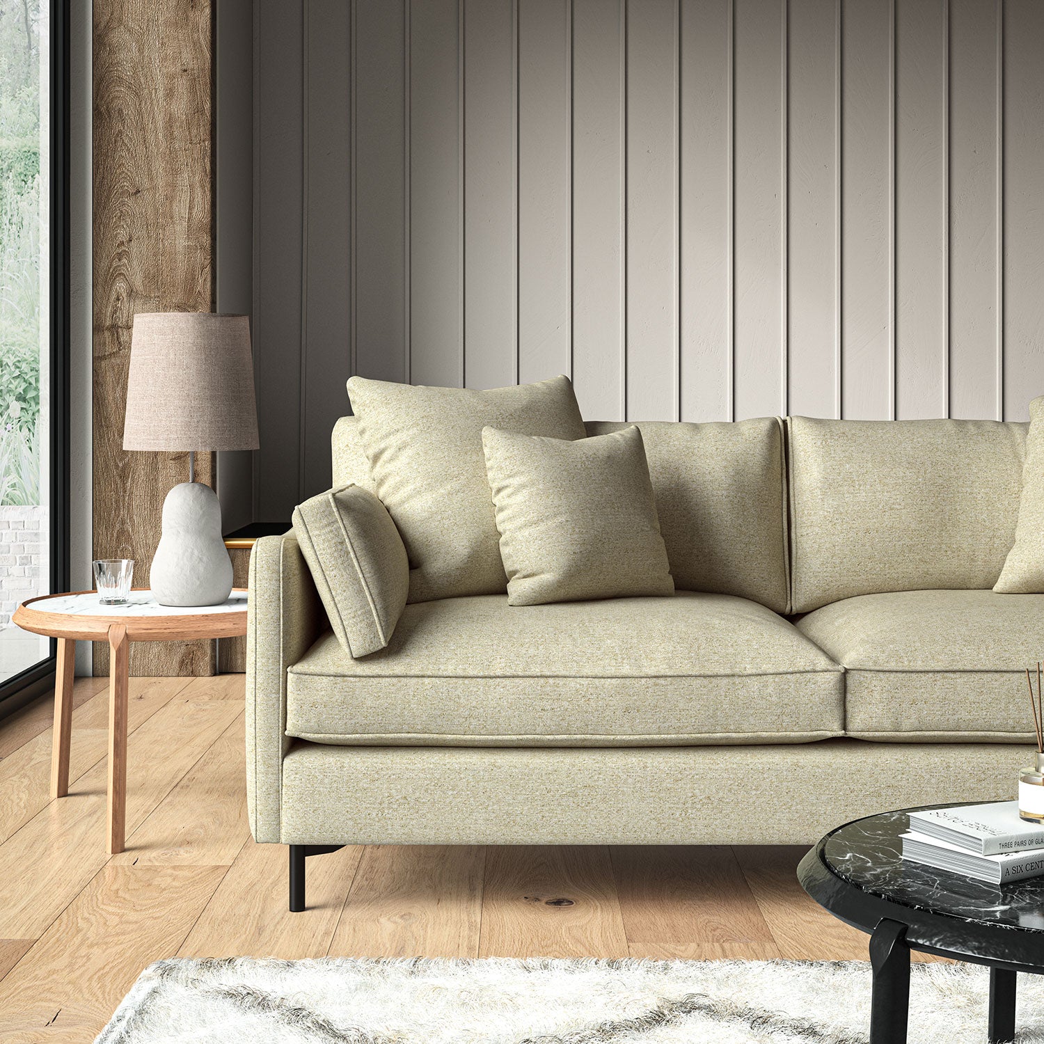 Woven light neutral coloured fabric on a sofa