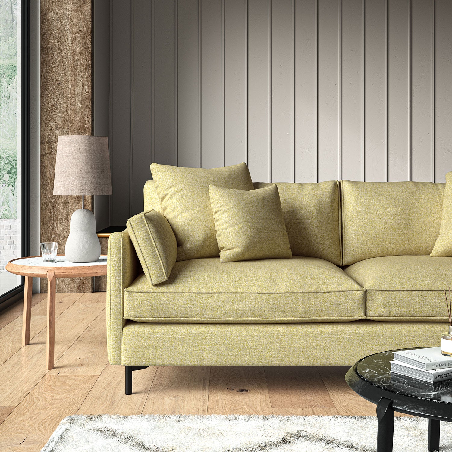 Woven light yellow coloured fabric on a sofa