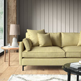 Woven light yellow coloured fabric on a sofa