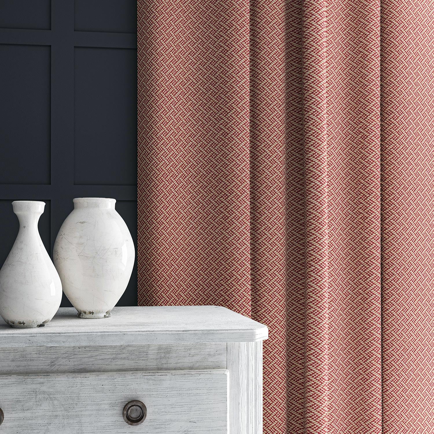 Curtain in red and off-white woven fabric featuring a trellis pattern.