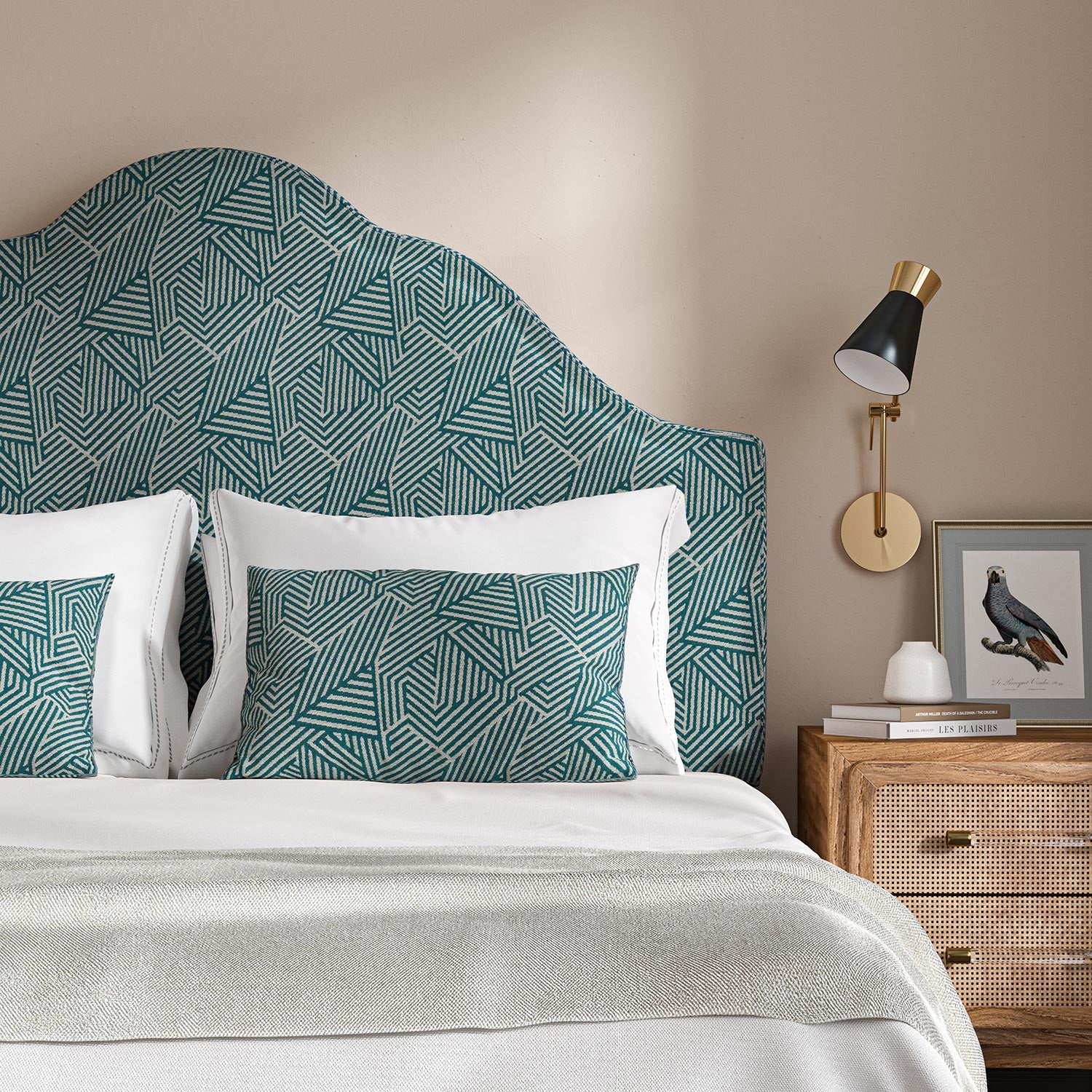 Headboard upholstered in a blue and off-white woven fabric featuring a geometric pattern.