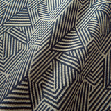 A woven fabric sample in blue and off-white featuring a geometric pattern.