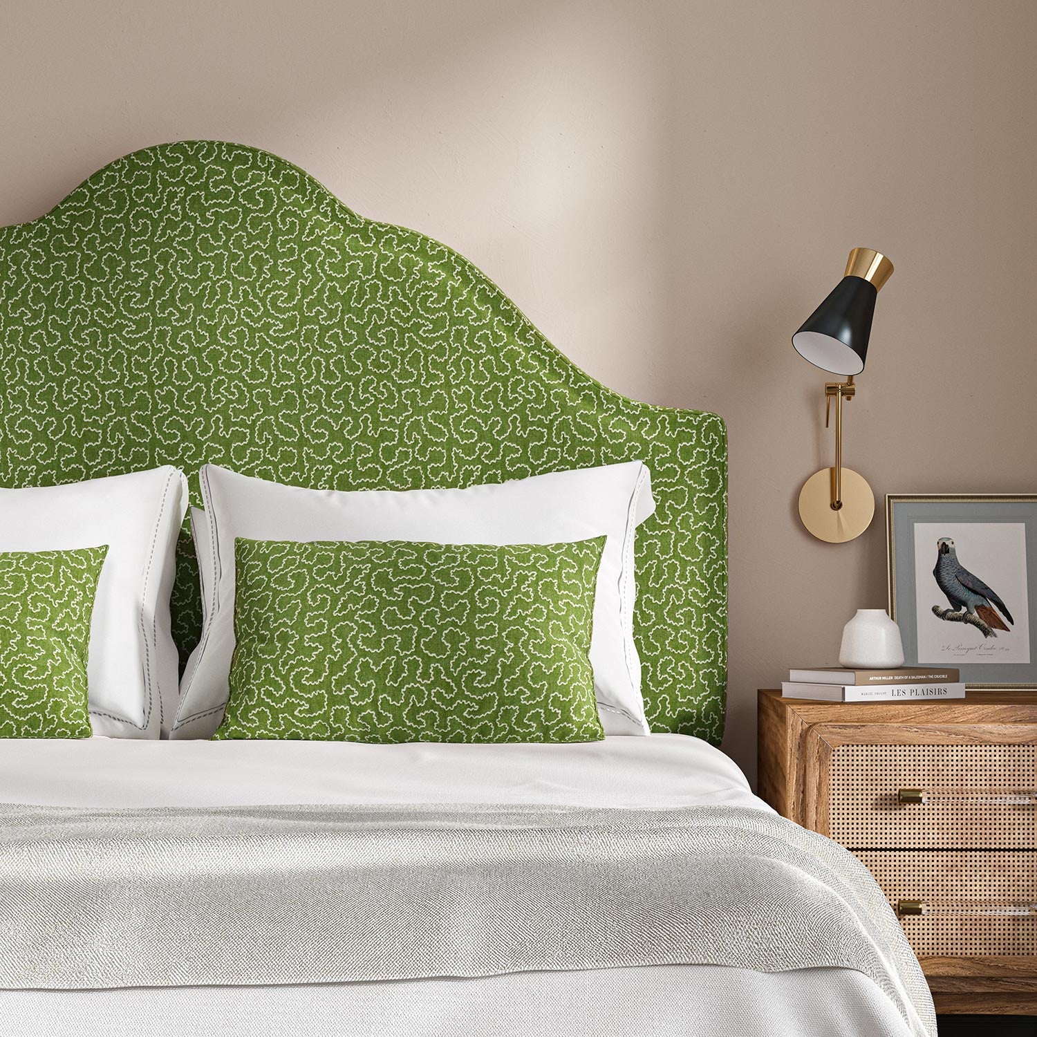 Headboard upholstered in a green and off-white woven fabric featuring a wavy pattern.