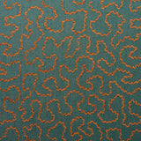 A woven fabric sample in blue and orange featuring a wavy pattern.