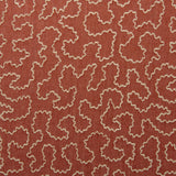 A woven fabric sample in red and off-white featuring a wavy pattern.
