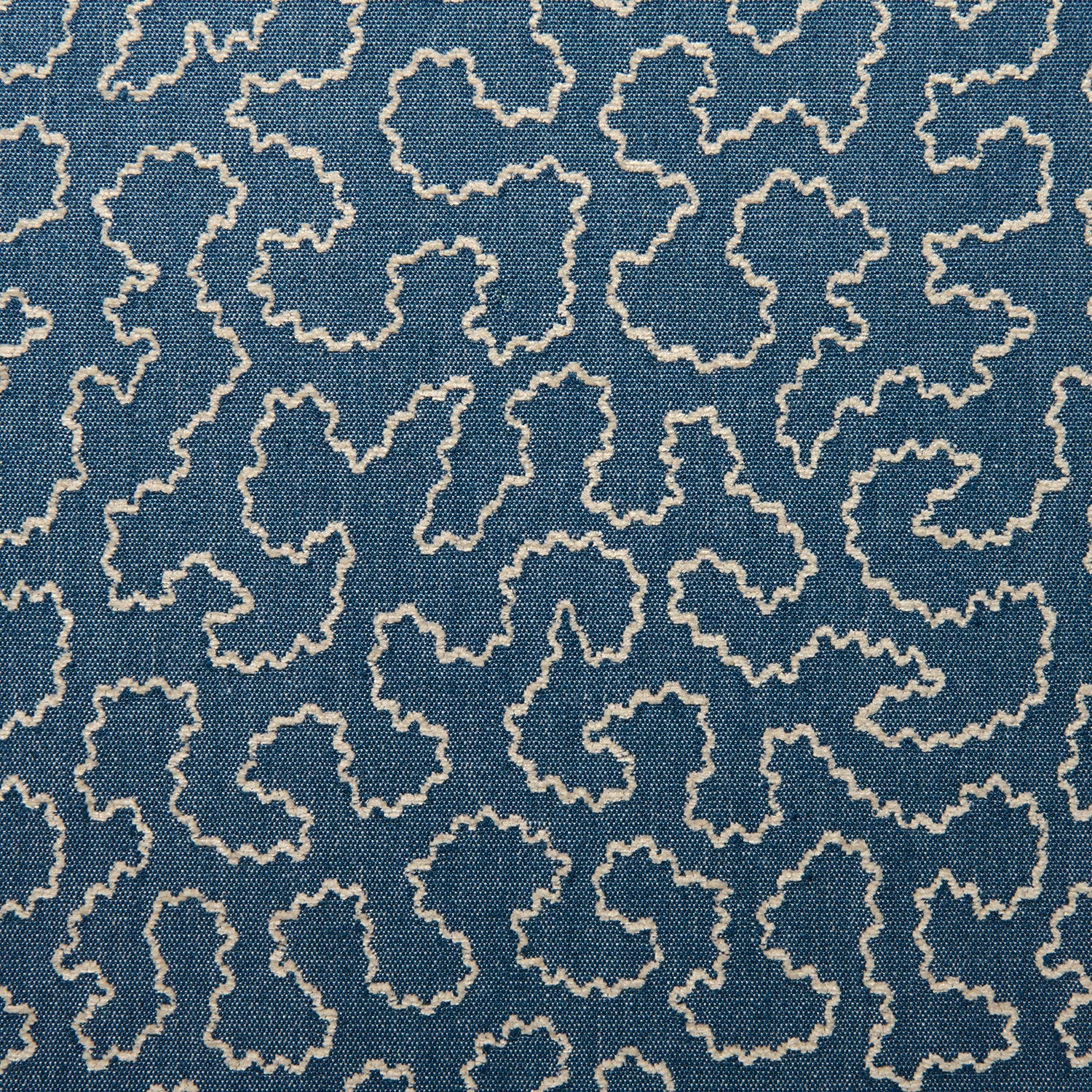 A woven fabric sample in blue and off-white featuring a wavy pattern.