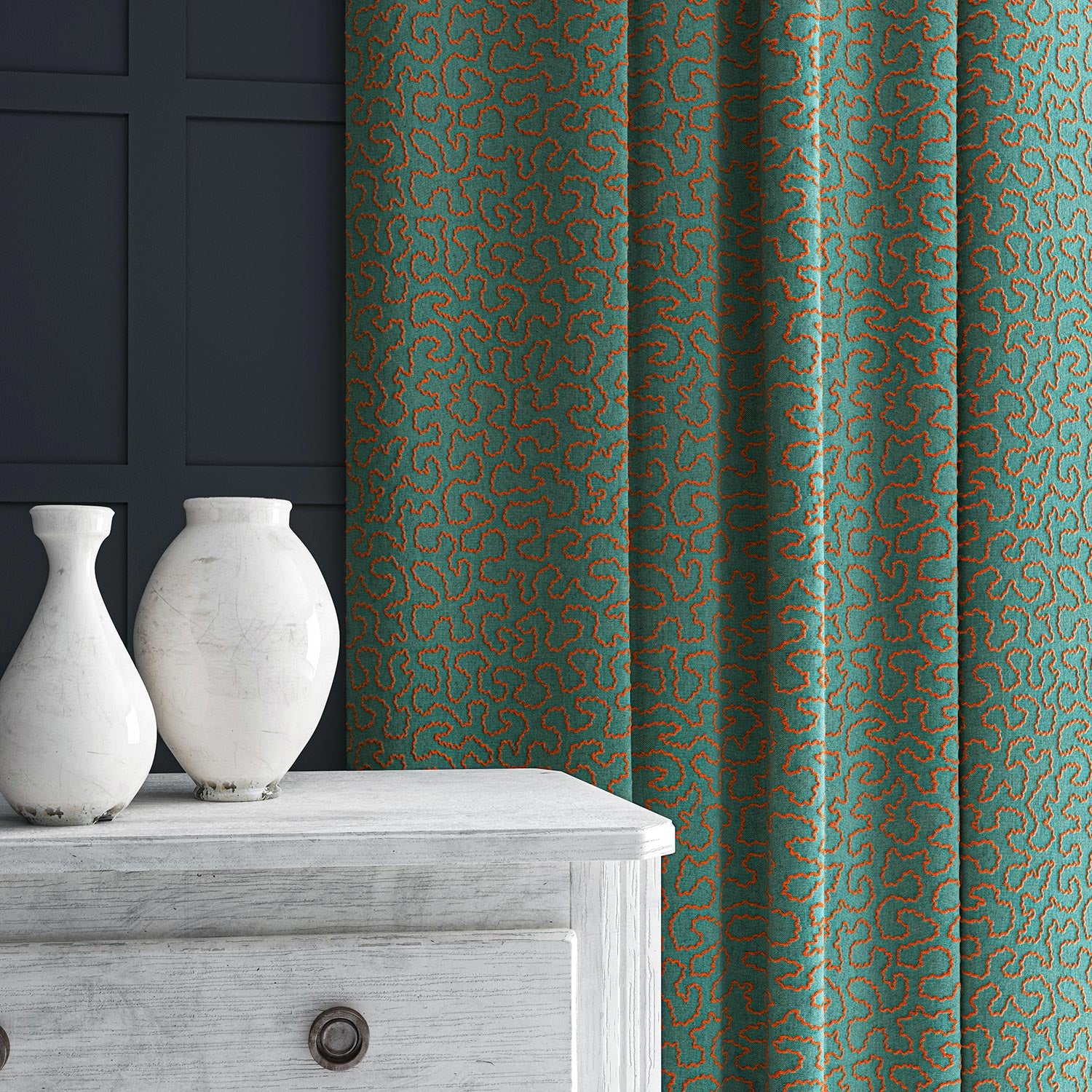 Curtain in blue and orange woven fabric featuring a wavy pattern.