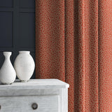 Curtain in red and off-white woven fabric featuring a wavy pattern.