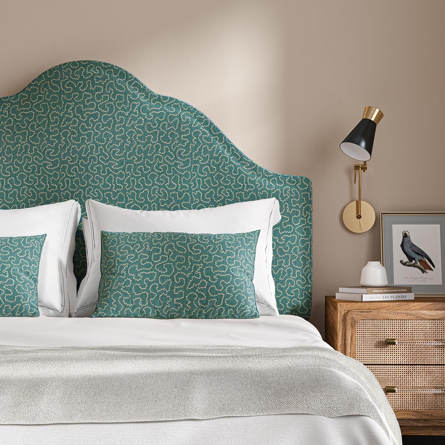 Headboard upholstered in a blue and off-white woven fabric featuring a wavy pattern.