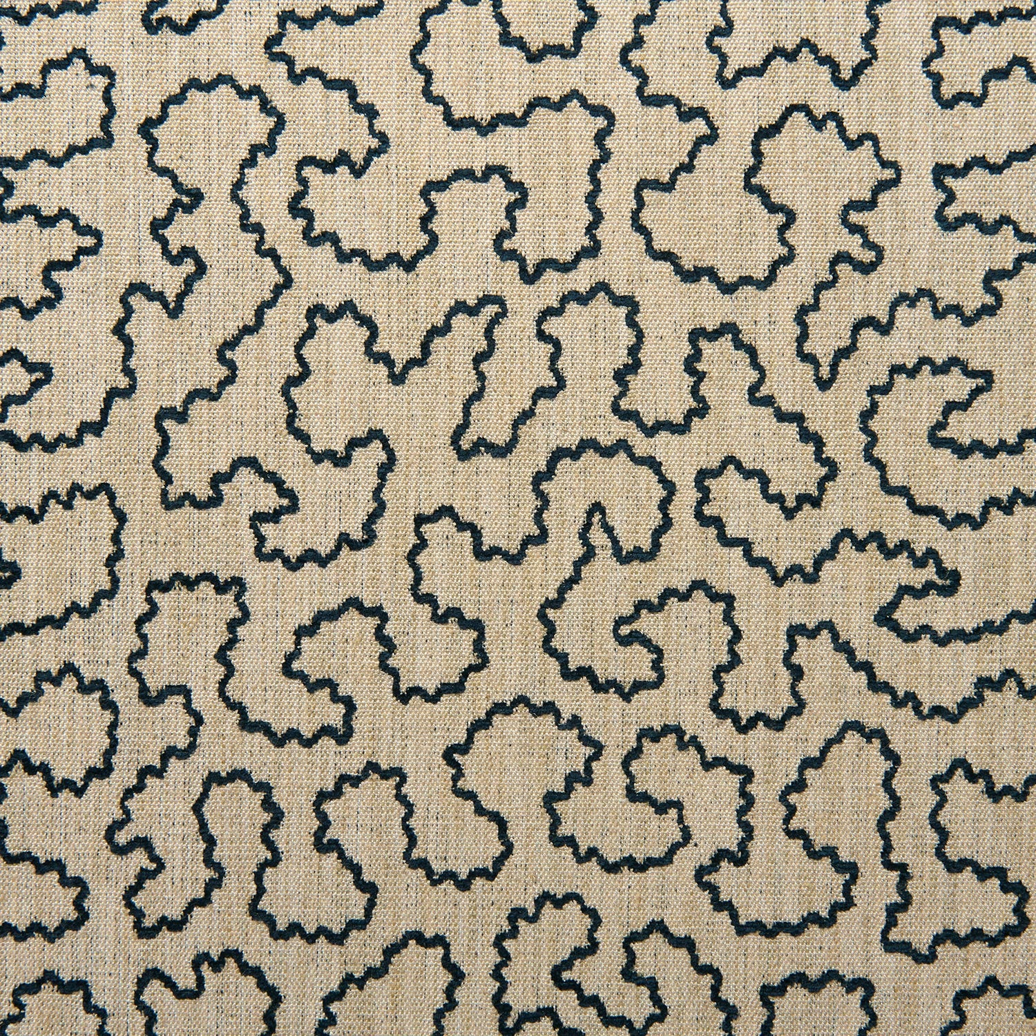 A woven fabric sample in black and beige featuring a wavy pattern.