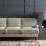 Sofa upholstered in a black and beige woven fabric featuring a wavy pattern.