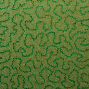A woven fabric sample in green featuring a wavy pattern.