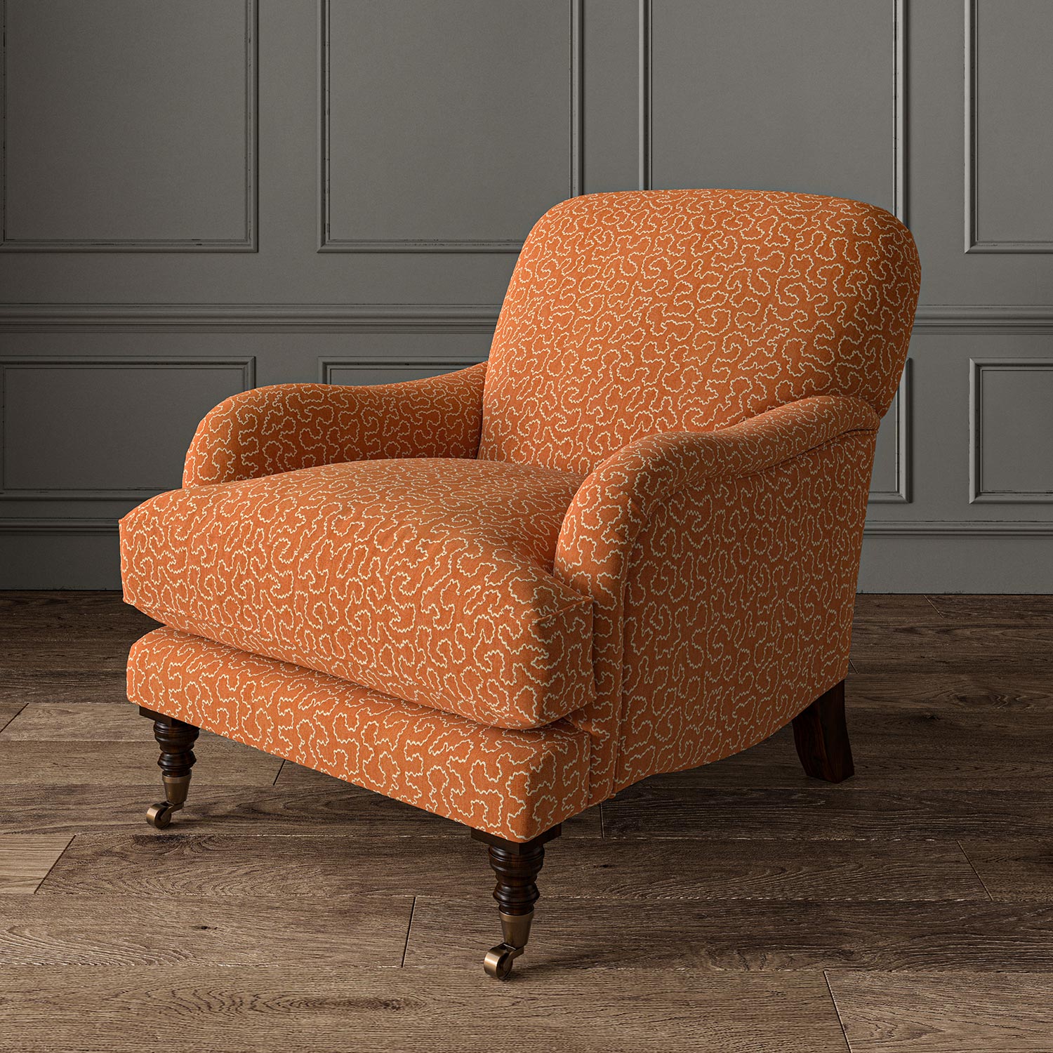 Chair upholstered in a orange and off-white woven fabric featuring a wavy pattern.