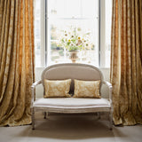 Curtains & cushions in a classic yellow floral fabric with stripe design