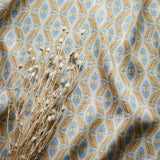 Printed linen fabric – a geometric design in pink, yellow and blue