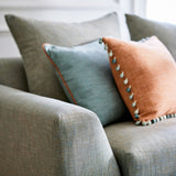 Blue sofa upholstered in a versatile woven fabric.