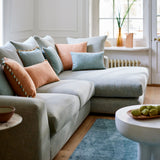Blue sofa upholstered in a versatile woven fabric.