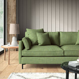 Green sofa upholstered in a versatile woven fabric.