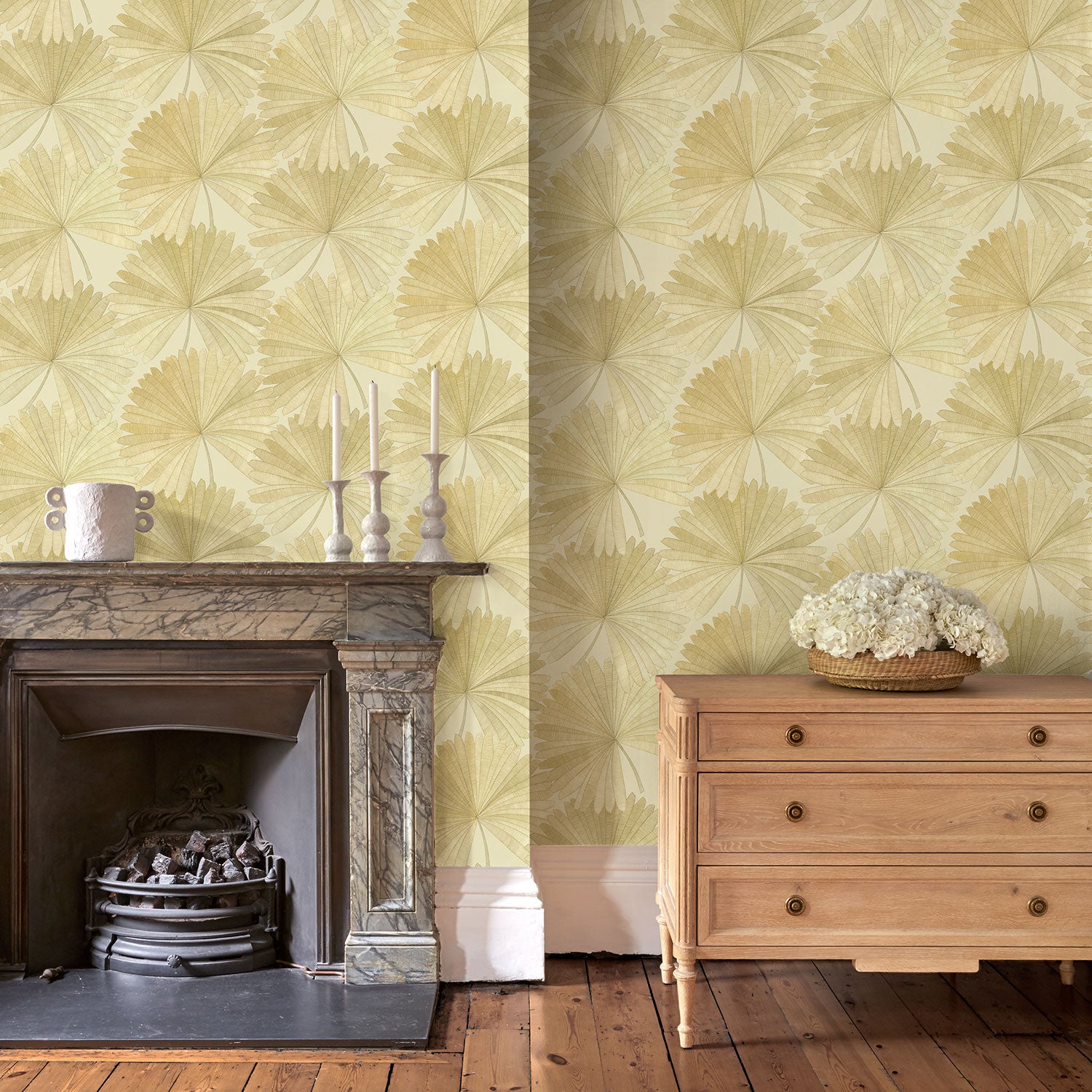 Living room featuring a contemporary floral wallpaper with tropical palms in neutral shades.