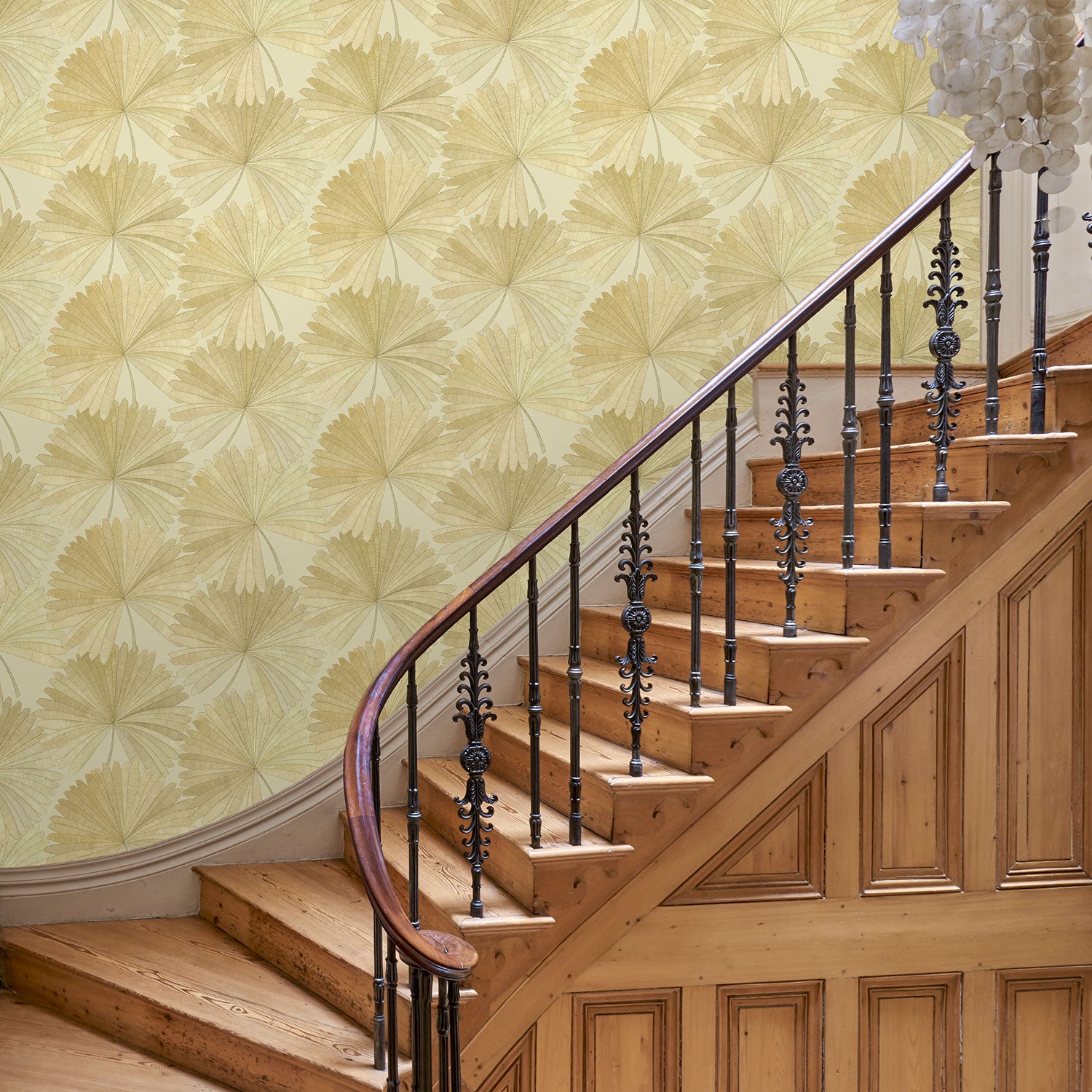 Hallway featuring a contemporary floral wallpaper with tropical palms in neutral shades.