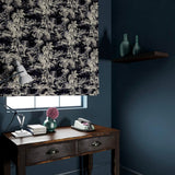 Blind in a printed velvet fabric featuring a rich, tropical-style toile in dark grey.