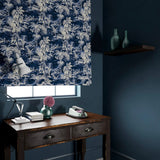 Blind in a printed velvet fabric showcasing a rich, tropical-style toile in Indigo.