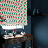 Blind in a velvet fabric with stain resistant finish and geometric print in peach and green colours