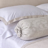 Pillow in a contemporary damask fabric in a cream colour.