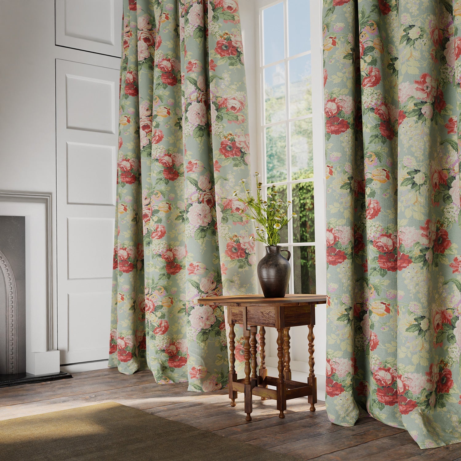Curtains in a printed linen fabric showcasing bouquets of pink and red roses.