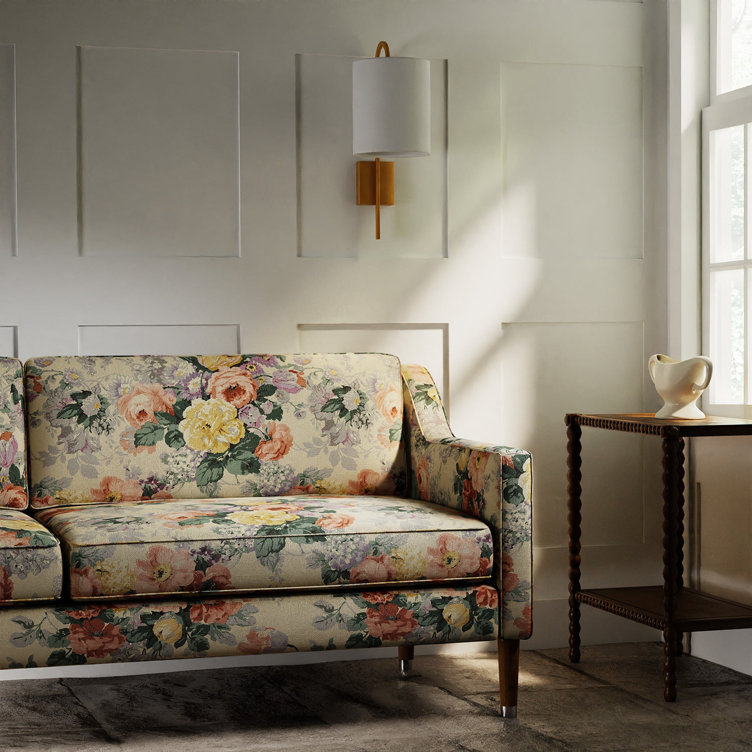 Sofa in a printed linen fabric with bouquets of roses on a tea-stained background.