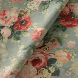 Printed linen fabric with bouquets of pink and red roses.