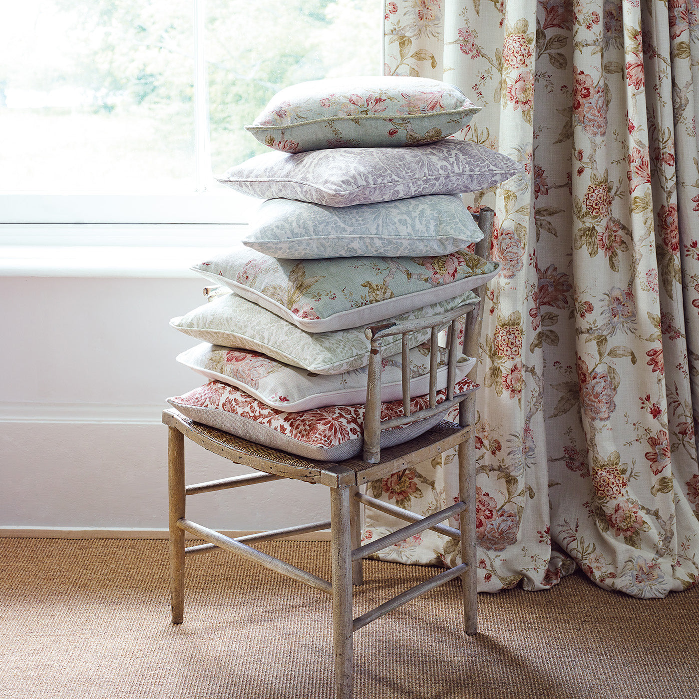 Curtains in a classic light coloured floral vintage inspired fabric